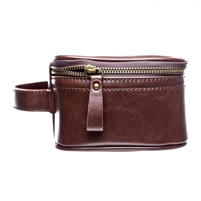 leather detail and hardware on mens toiletry bag