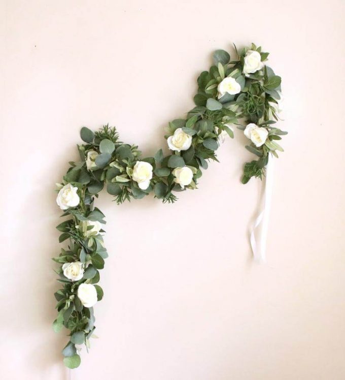 faux eucalyptus garland with flowers
