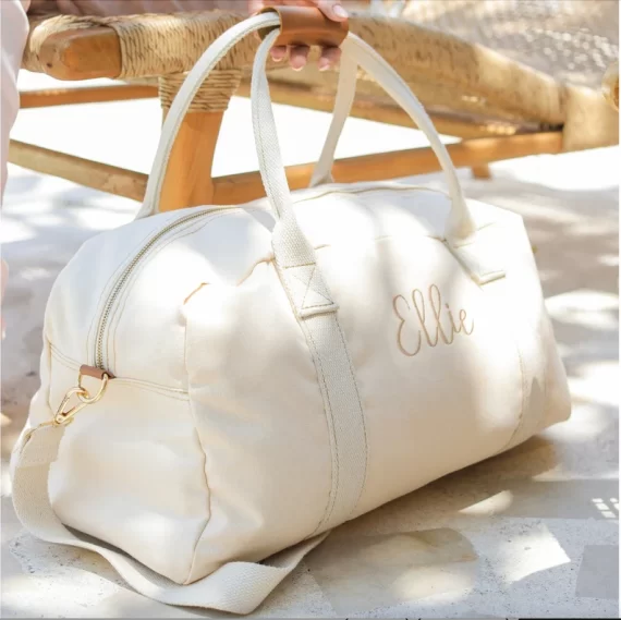 personalized weekender bag with name embroidered for non-cliche or non-cheesy bridesmaid gifts