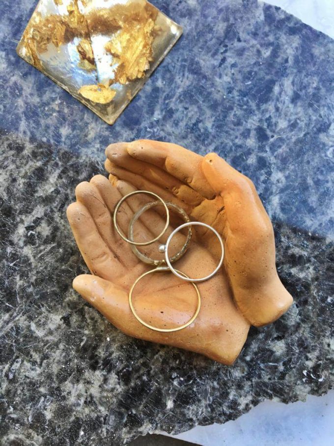 hands ring dish