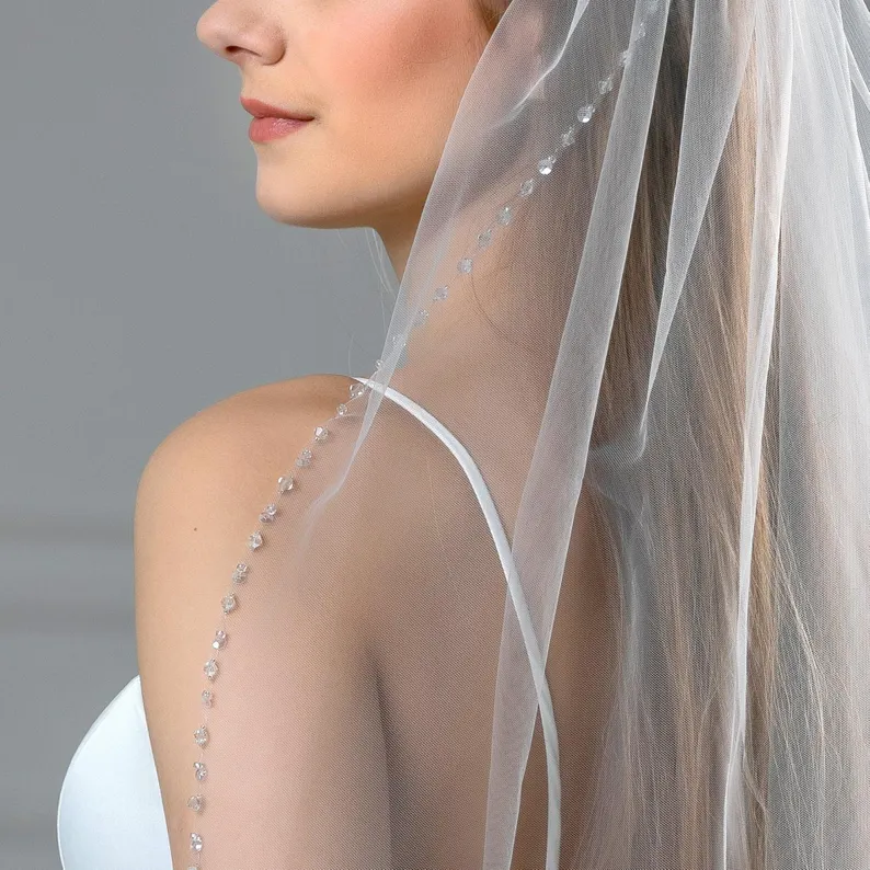 Cathedral length wedding veil with delicate rhinestone trim