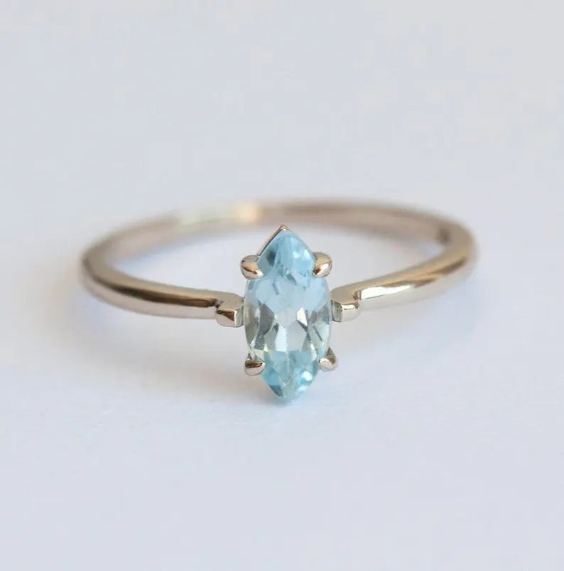 blue aquamarine engagement ring