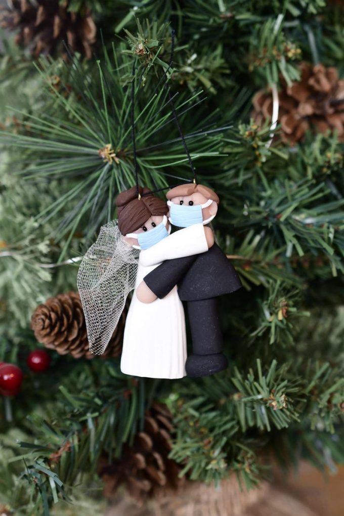 bride and groom with mask ornament