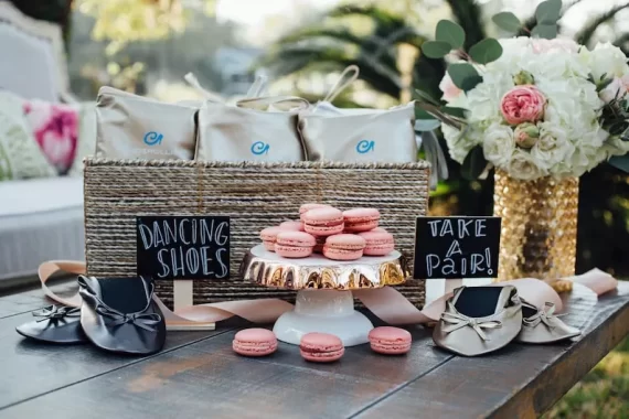 photo of dancing shoes slippers at wedding for guests to take