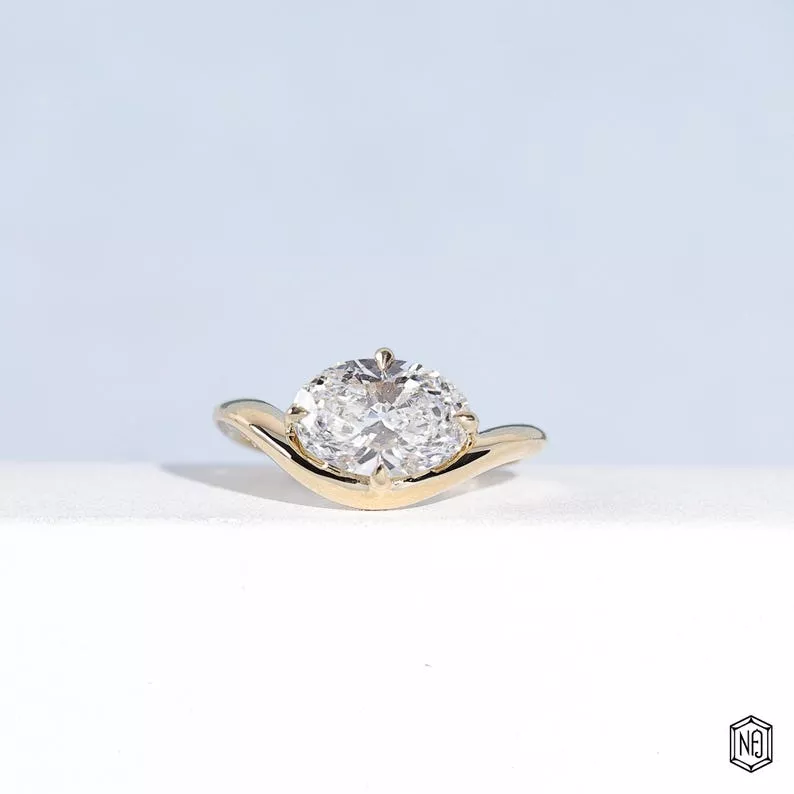 east-west engagement ring with a horizontal stone