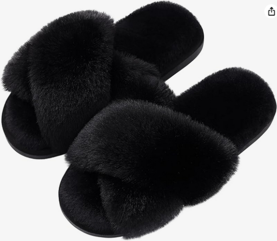up-close pair of fuzzy black slippers for the bridal party to wear