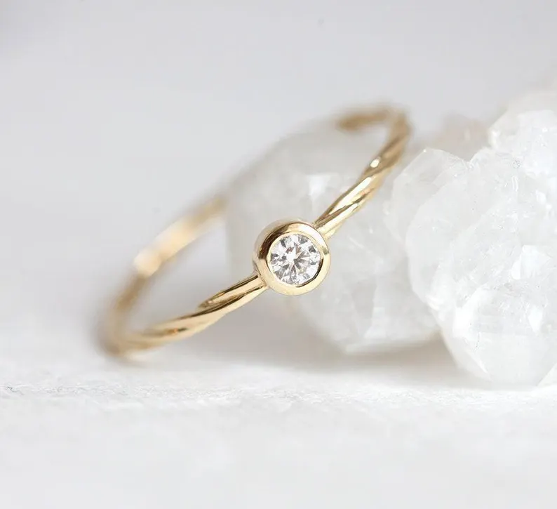 solitaire diamond engagement ring with rope band
