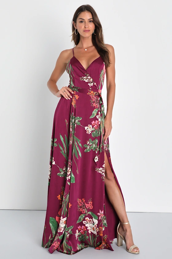 Wrap bridesmaid dress in burgundy floral paired with navy suit for elegant wedding
