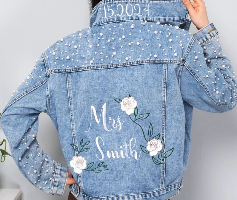 distressed vintage style bride denim jacket floral embroidery relaxed wedding look