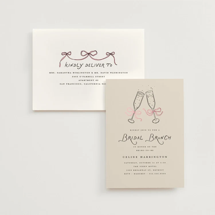 bridal shower invitation envelopes styled flat lay showing wedding guest list etiquette planning