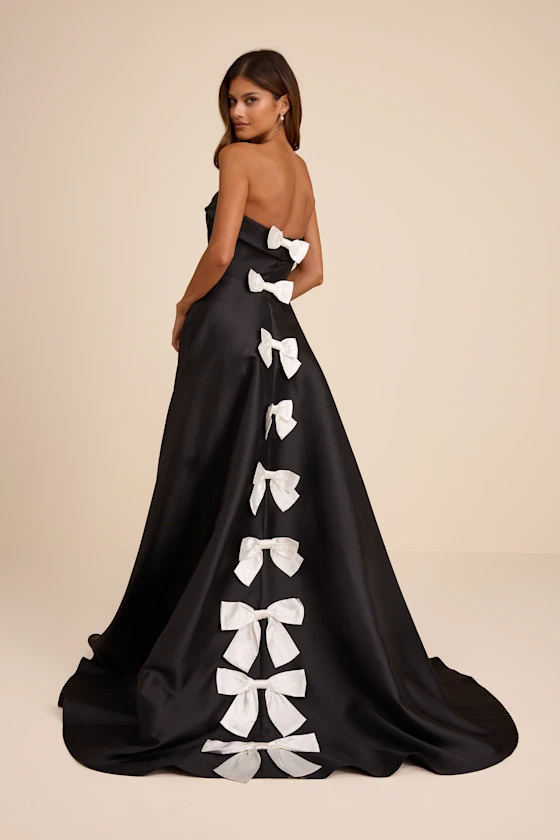 taffeta black wedding dress with white bows on back