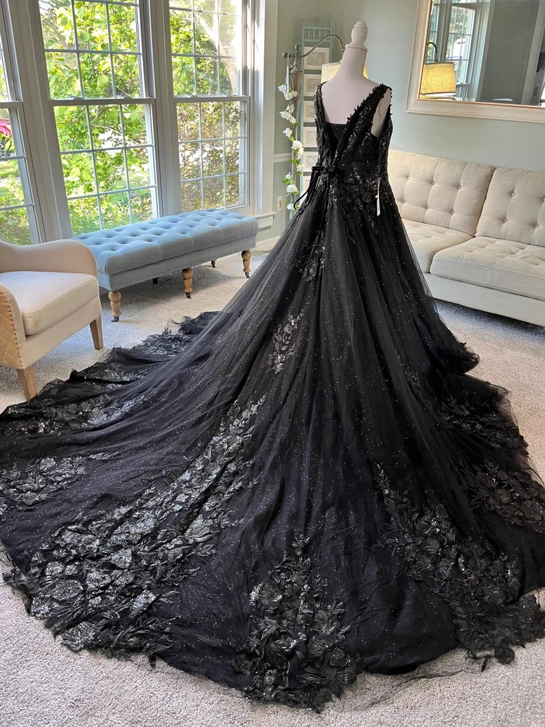 long elegant lace black wedding gown with train