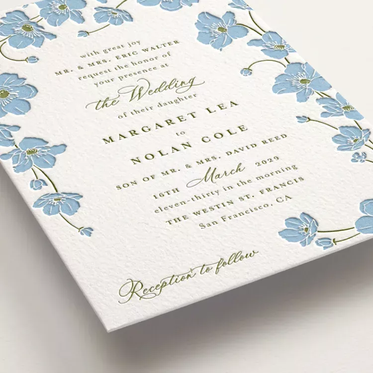 letterpress wedding invitation showing bright colored flowers