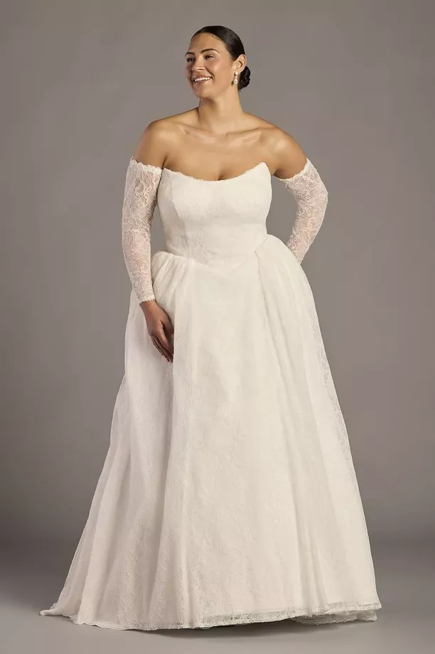 Ivory lace basque-waist corset ball gown with a full skirt