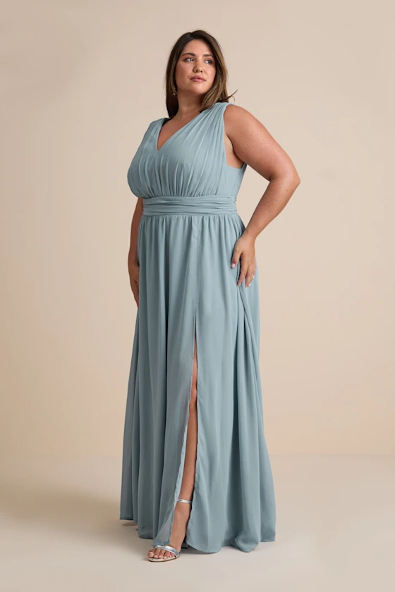 light blue wedding guest dress that flows away from midsection to hide belly bulge
