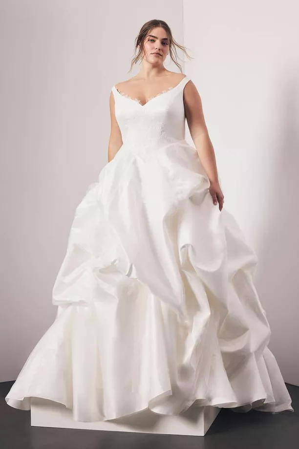 wedding dress with flowy bodice away from tummy bulge