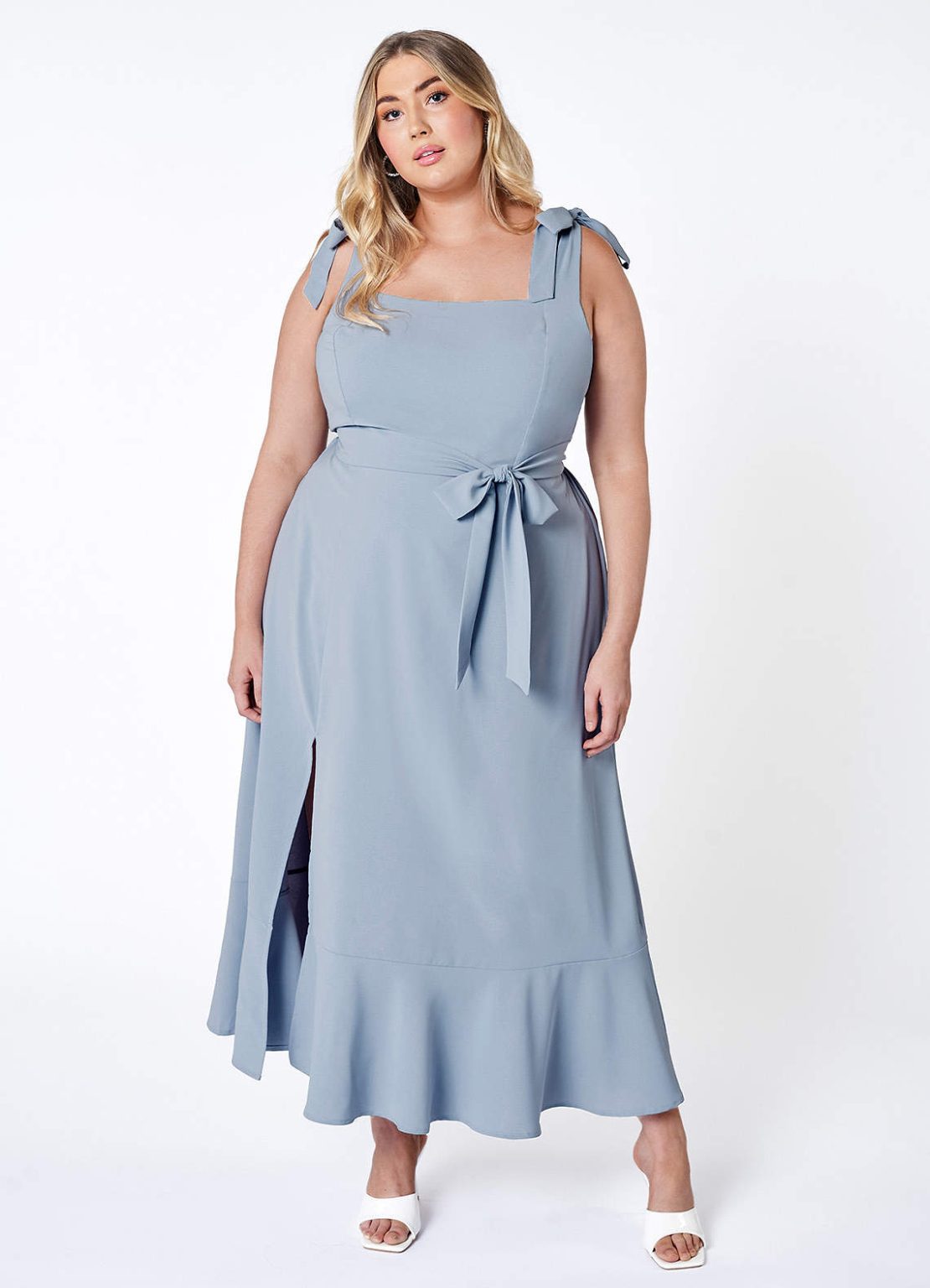 22 Flattering Wedding Guest Dresses That Hide the Belly Area
