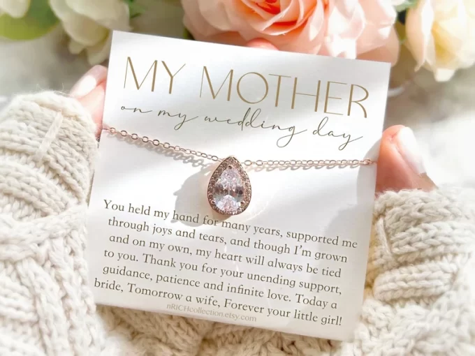 mother of the bride teardrop pendant that sparkles and has a gift message attached to it from the bride