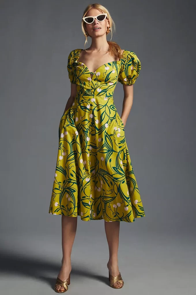 green print dress with floral design and puff sleeves