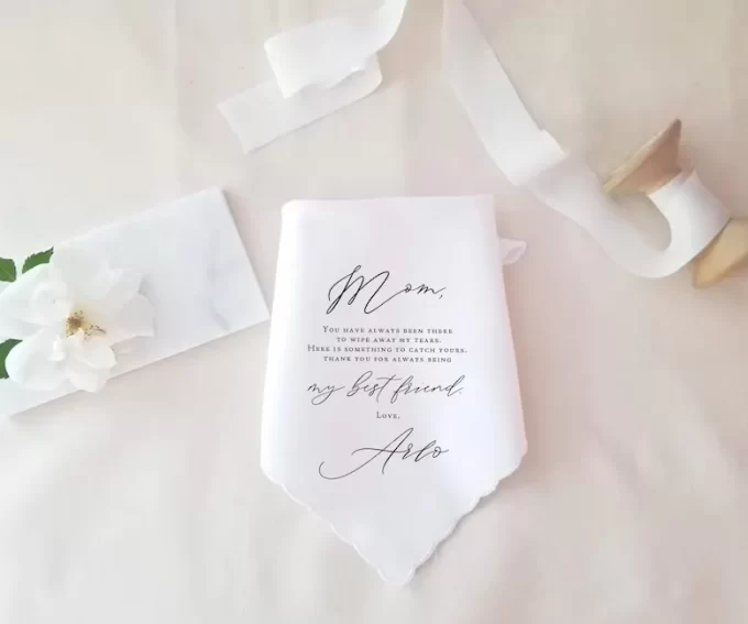 handkerchief that is personalized for the mother of the bride on the wedding day from the bride