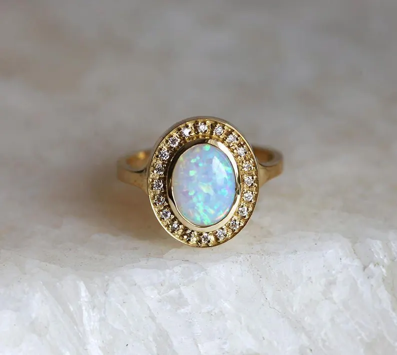 oval opal diamond halo engagement ring