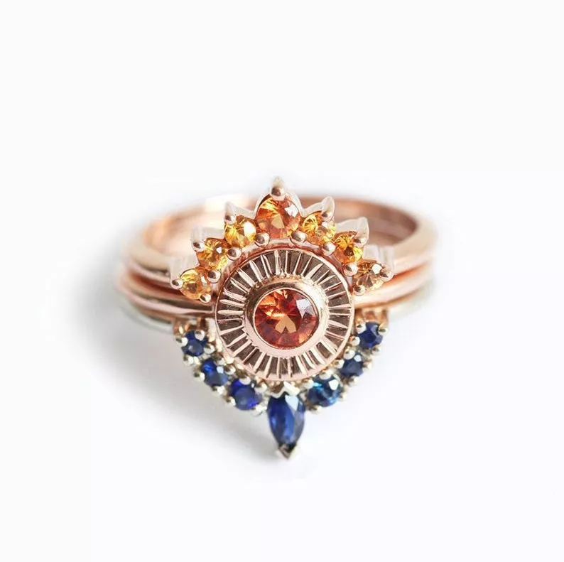 orange and blue sapphire engagement ring