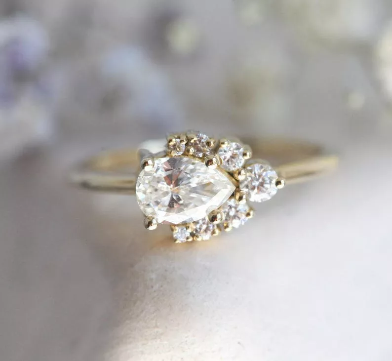 pear cut diamond cluster engagement ring