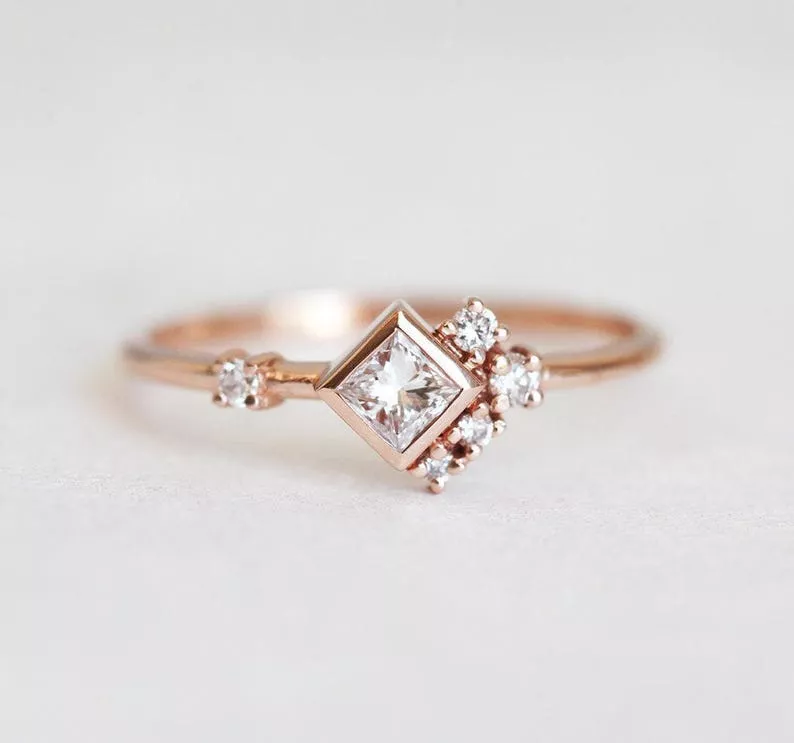 rose gold diamond cluster engagement ring