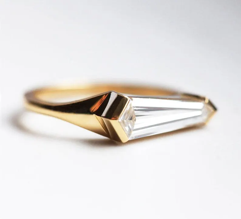 shield-cut moissanite engagement ring