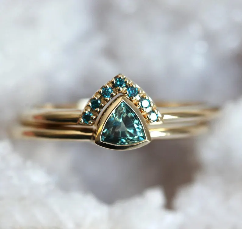 trillion style sapphire engagement ring