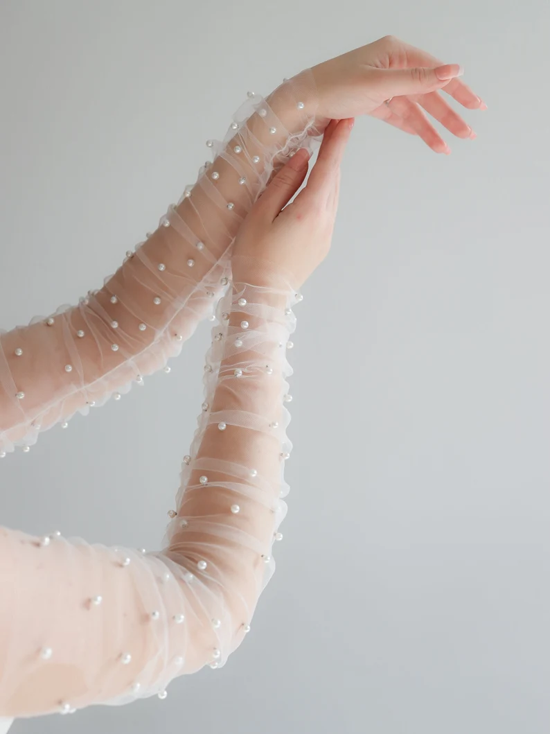long fingerless gloves that look like sleeves