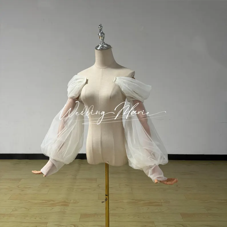 off-the-shoulder detachable sleeves for a wedding dress