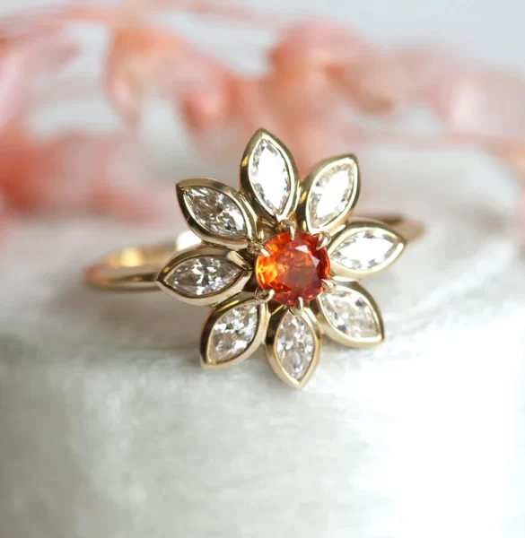 pretty orange floral engagement ring with petals