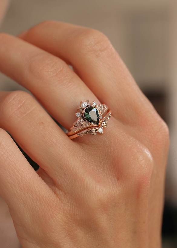 green sapphire engagement ring with nature inspired band