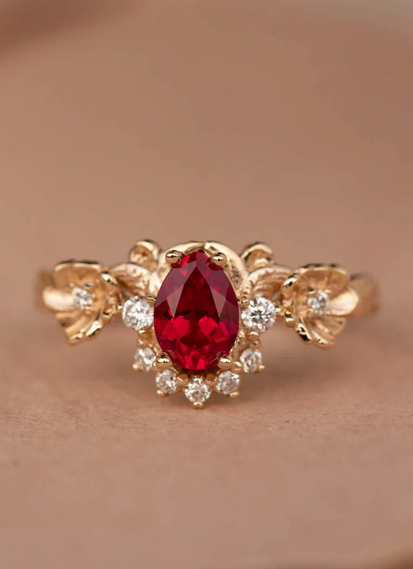 ruby and diamond engagement ring with flower band
