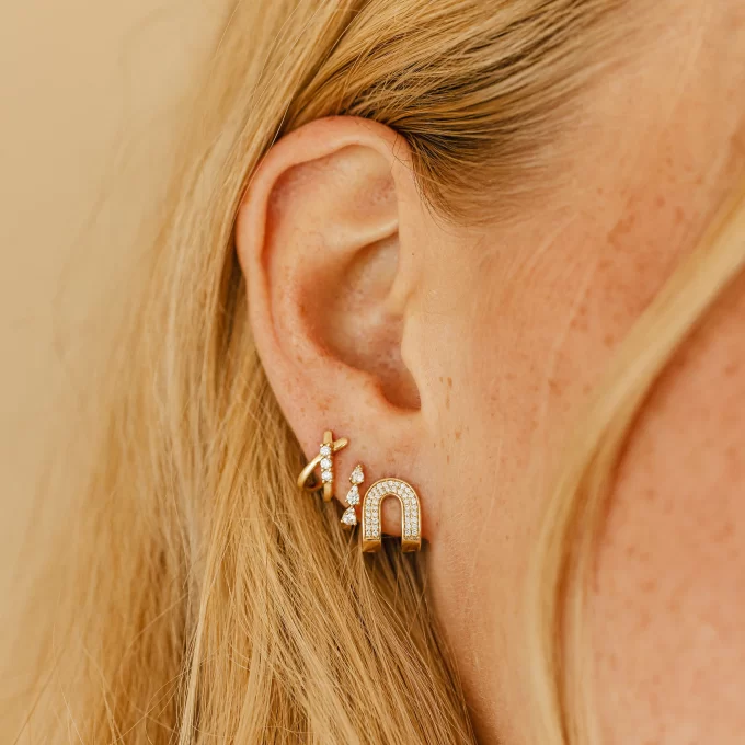 x huggie earrings with diamonds