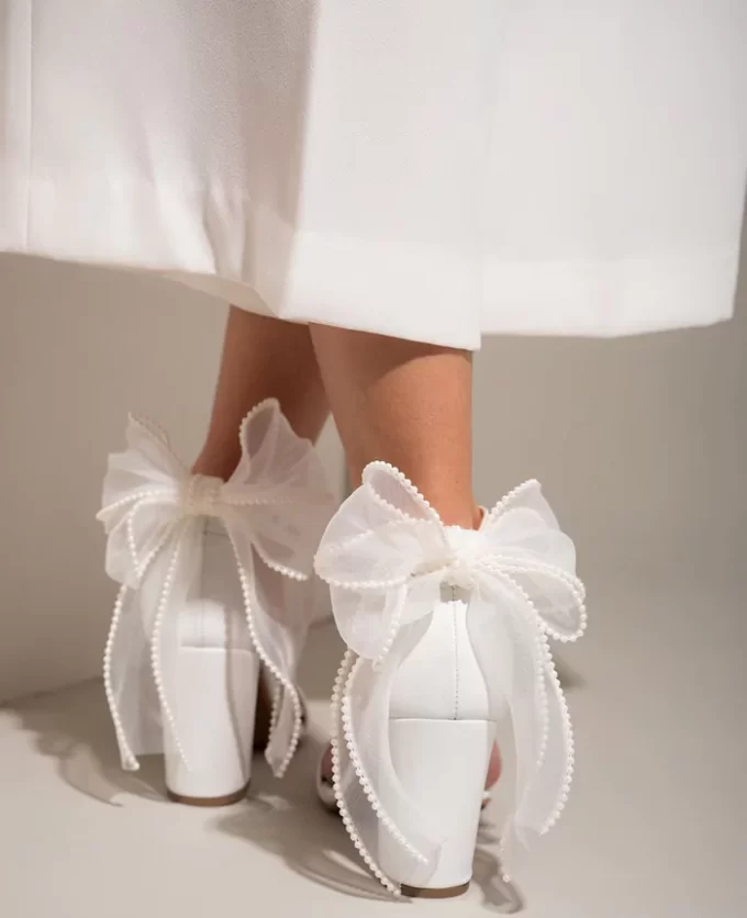 wedding block heel with organza ribbon that has pearls on it