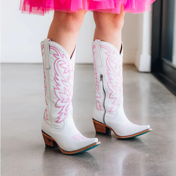 white boots with hot pink design