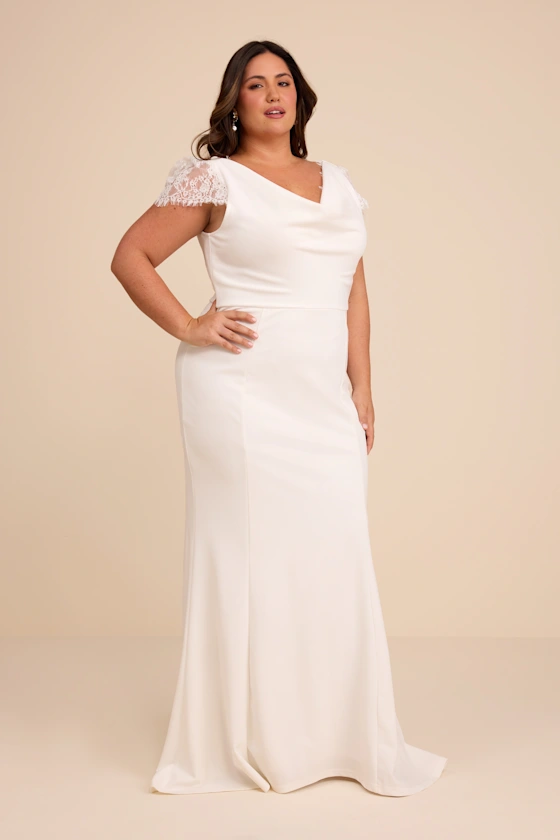 plus size bride wearing cap sleeve white bridal shower dress