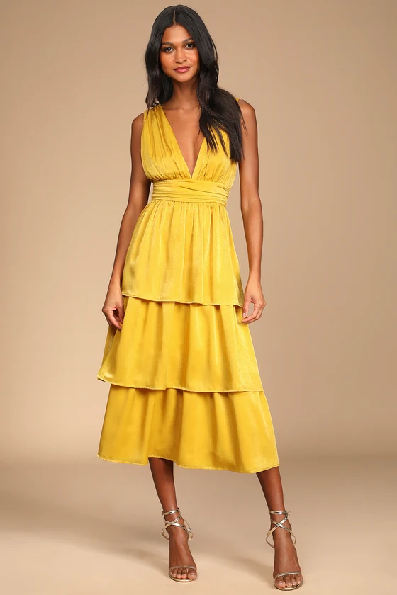 v-neck dress with sleeveless style and tiered satin layers in mustard yellow