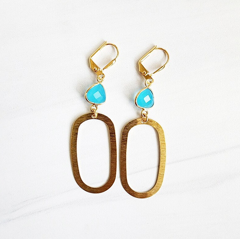 oval gold earrings with blue gemstone