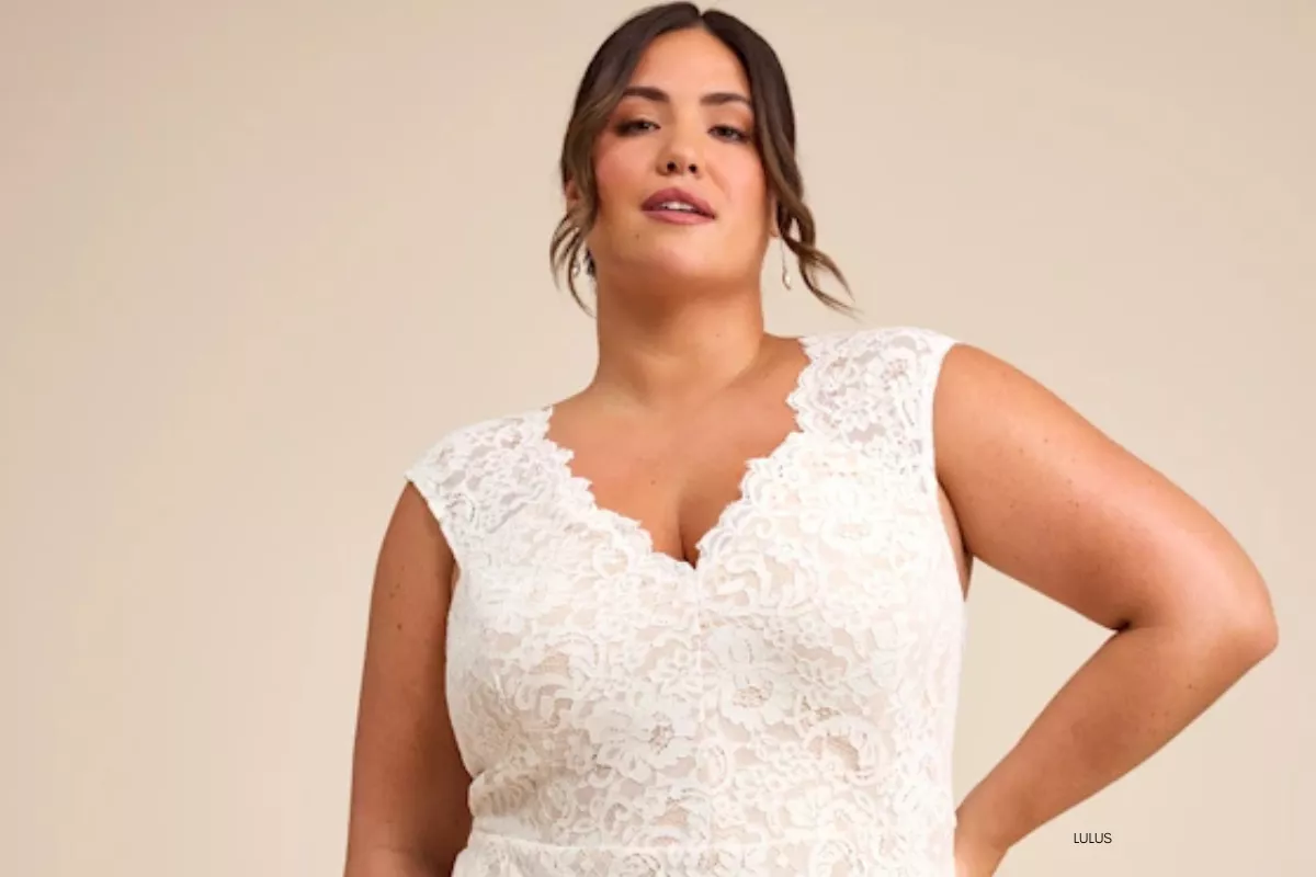 plus size bride wearing a white bridal shower dress in a flattering silhouette for her bridal shower celebration