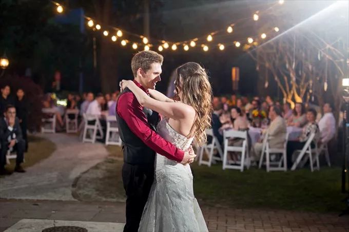 string lights decorating an outdoor fall wedding