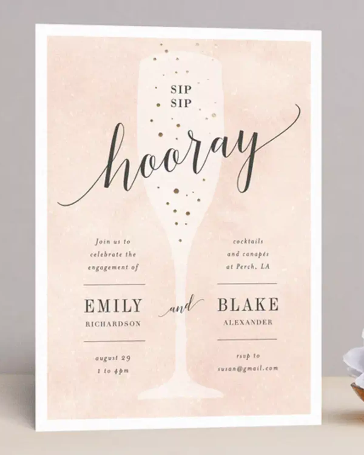 Close-up of Pearls and Prosecco bridal shower invitation showing delicate pearl details and elegant font