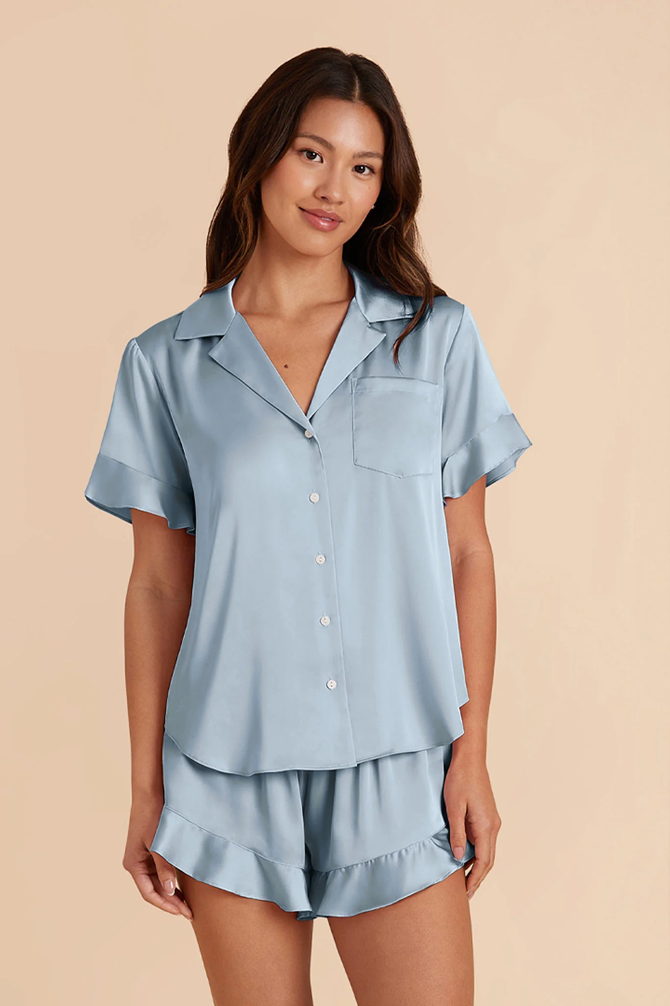 blue satin bridesmaid pajama set with ruffles and shorts and short sleeve combination