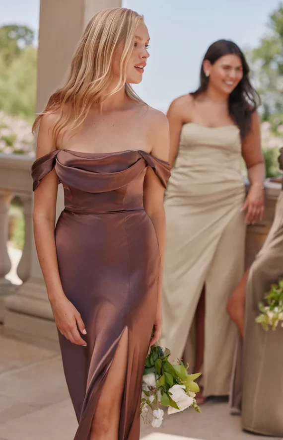 bridesmaids in neutral shades different color but they don't look like bridesmaid dresses