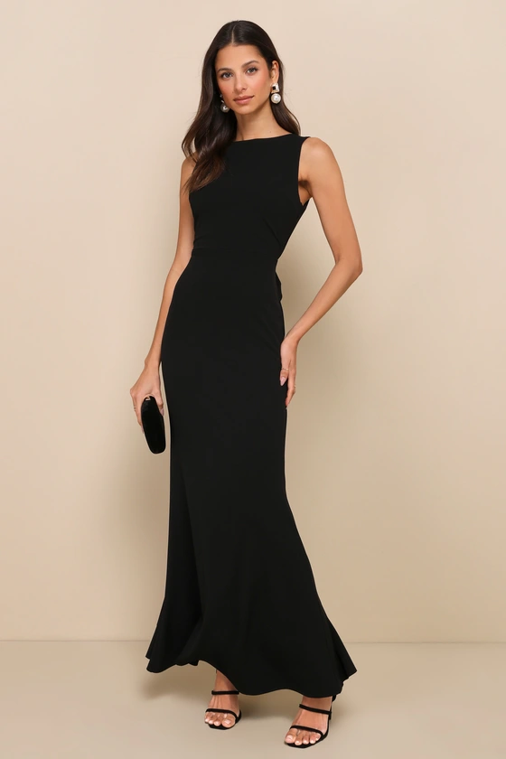 black wedding guest dress with high neck and long maxi skirt