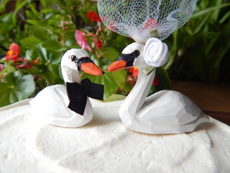 handcrafted swan wedding cake topper