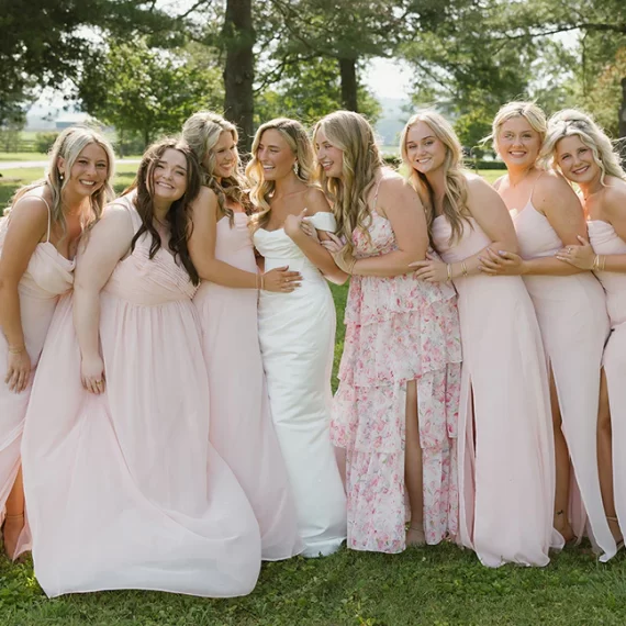 Dusty rose affordable bridesmaid dress from Birdy Grey with modern wrap silhouette