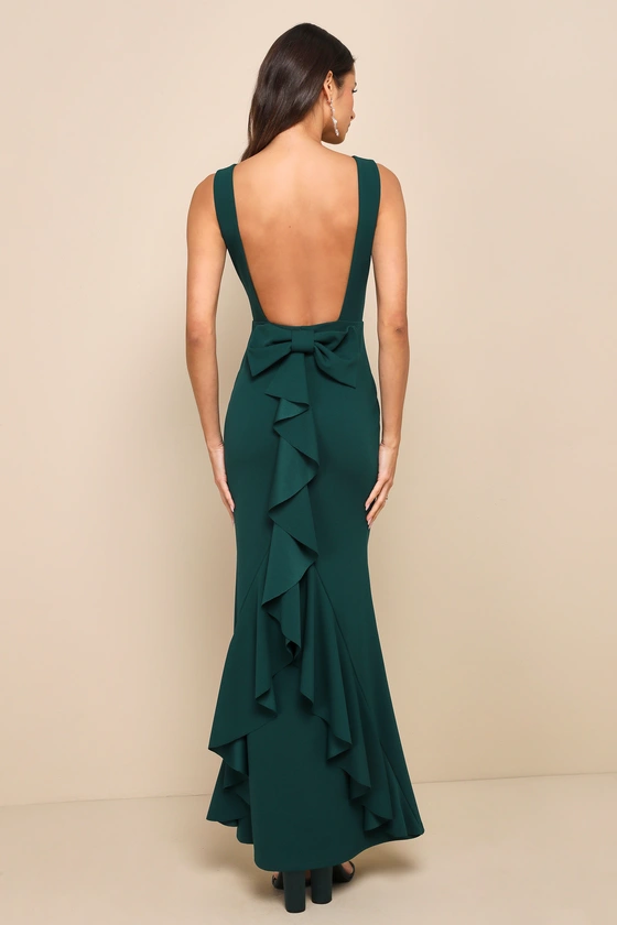 elegant emerald green maxi with box on back and ruffles